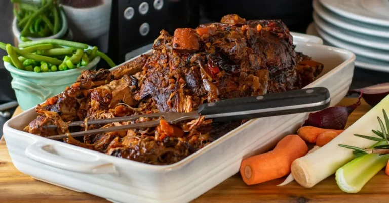 A hearty slow cooker pot roast with tender beef, vegetables, and rich gravy.