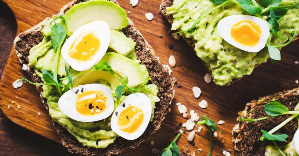 A delicious avocado toast recipe with mashed avocado on toasted bread, topped with chili flakes.