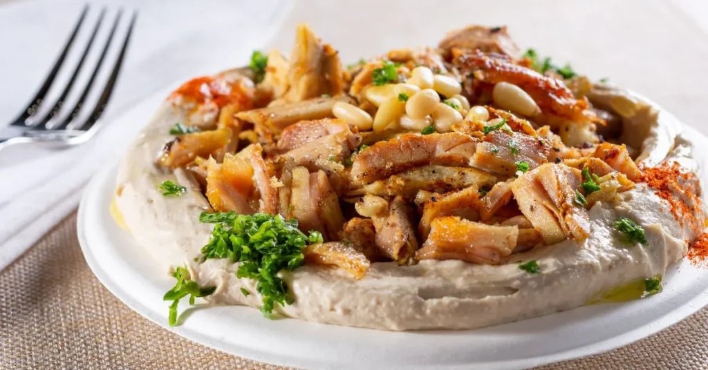 A bowl of quick beef stir-fry with tender beef slices, colorful vegetables, and a savory sauce.