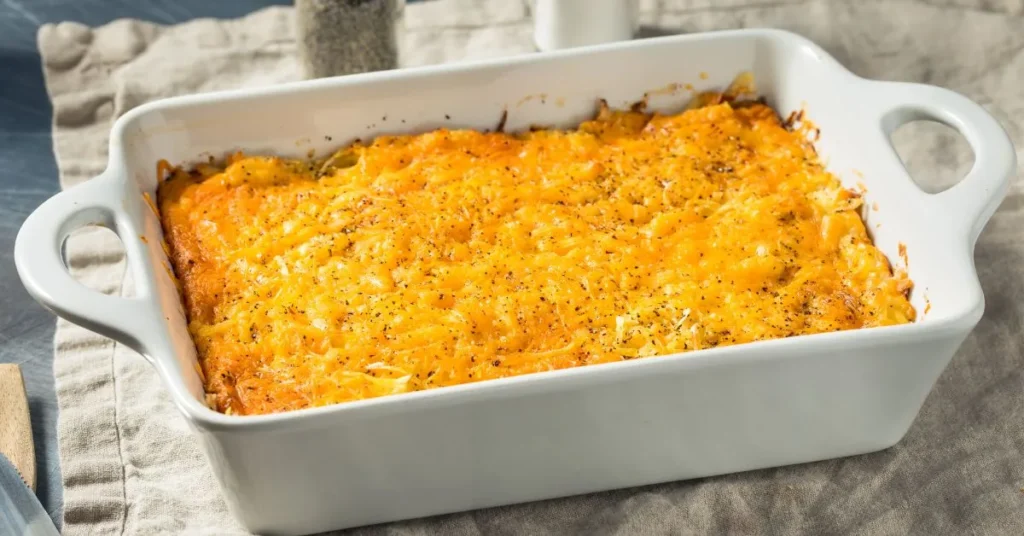 A sweet and savory pineapple casserole with a crispy cracker topping and melted cheese.