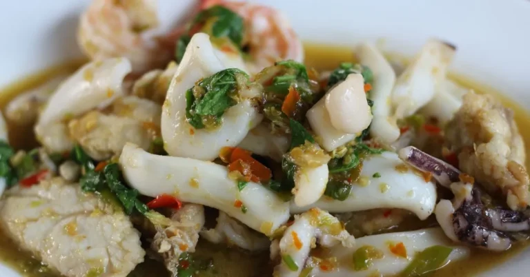 A close-up of a savory grilled king trumpet mushroom dish.