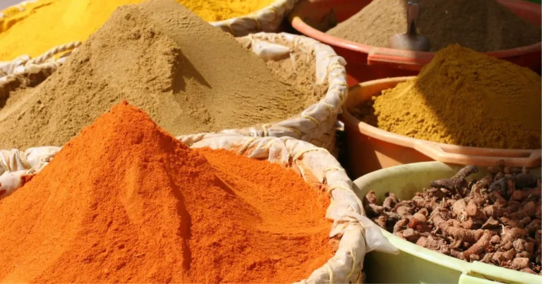 A vibrant pile of Berbere spice, a traditional Ethiopian spice blend with a deep red color and rich, aromatic flavor.