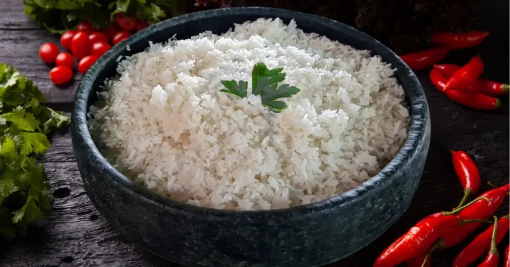 A bowl of fluffy, perfectly cooked Jasmine rice from the Instant Pot, ready to serve alongside a delicious meal.